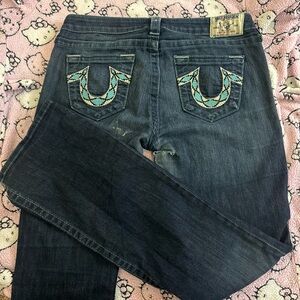 True Religion blue stitching low rise bootcut jeans.